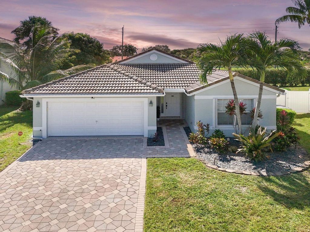 Photo of 8260 Palm Gate Dr, Boynton Beach, FL 33436 (MLS # F10532430)