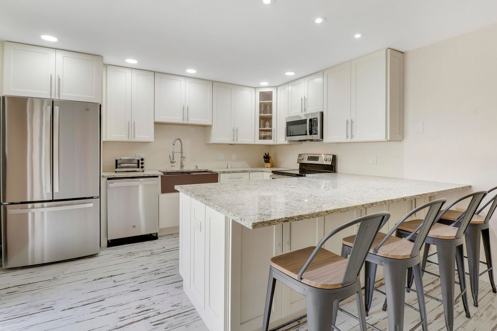 Photo of 1420 Ocean Way, Jupiter, FL 33477 (MLS # B26008940)