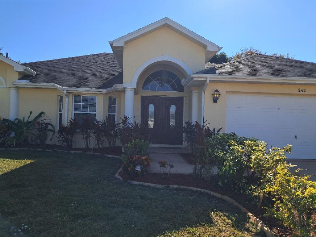 Photo of 242 SW Amesbury Avenue, Port Saint Lucie, FL 34953 (MLS # B26026231)