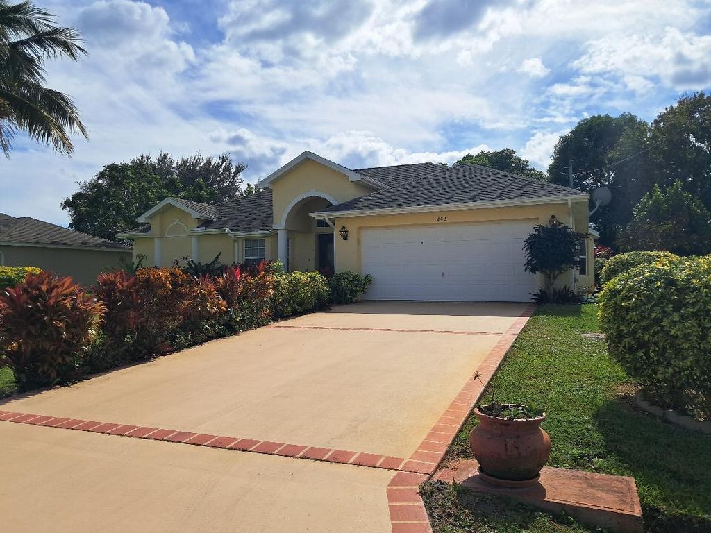 Photo of 242 SW Amesbury Avenue, Port Saint Lucie, FL 34953 (MLS # B26026231)
