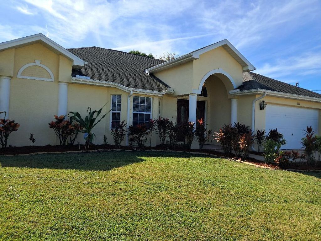 Photo of 242 SW Amesbury Avenue, Port Saint Lucie, FL 34953 (MLS # B26026231)
