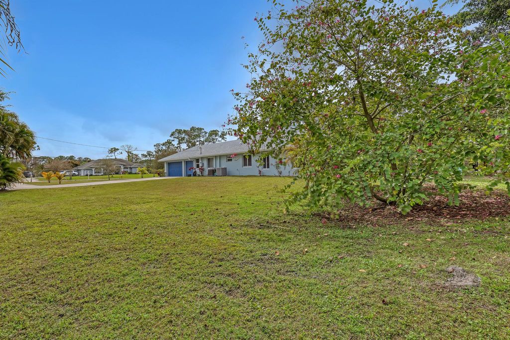 Photo of 12553 N 83rd Lane N, West Palm Beach, FL 33411 (MLS # R10999452)