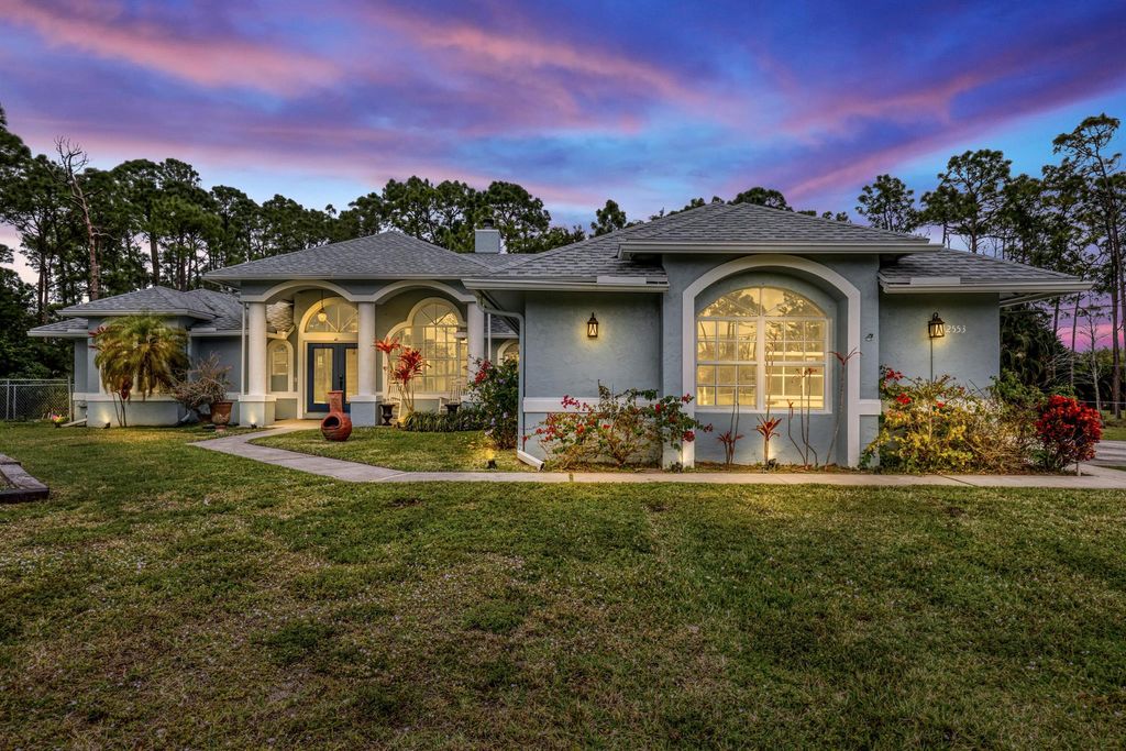 Photo of 12553 N 83rd Lane N, West Palm Beach, FL 33411 (MLS # R10999452)