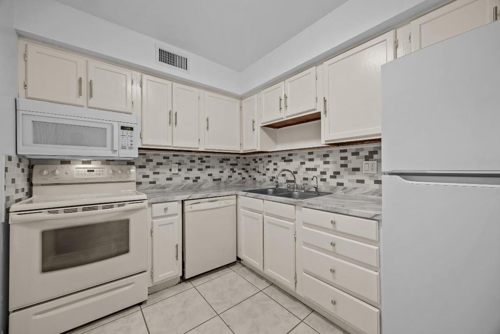 Photo of 9905 Pineapple Tree Drive #210, Boynton Beach, FL 33436 (MLS # R11138721)