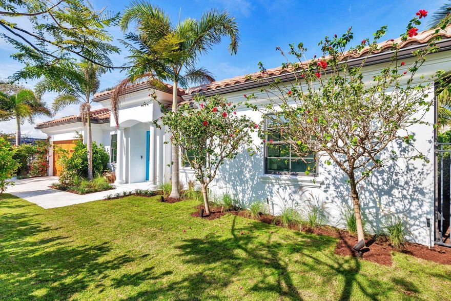 Located one home off South Flagler Drive, stunning & serene one story, 4BR/4.5BTH  Bermuda style, approx. 3500 sq. ft. with 2 car garage. Seamless indoor-outdoor flow, with abundant natural light enhancing the elegant design & neutral color palette. 10 foot ceilings, recently renovated elements including quartz clad fireplace & wide plank floors throughout adding to the home's refined aesthetic. Gorgeous kitchen with quartz counters, waterfall island & modern stainless steel appliances including gas range & wine fridge. Custom cabinetry flows effortlessly into the informal living/dining spaces. All bedroom features ensuite baths with a dual vanity & soaking tub in the primary. Lush landscaping & vibrant foliage create an inviting oasis complimented by the poolside lanai. Impact windows.