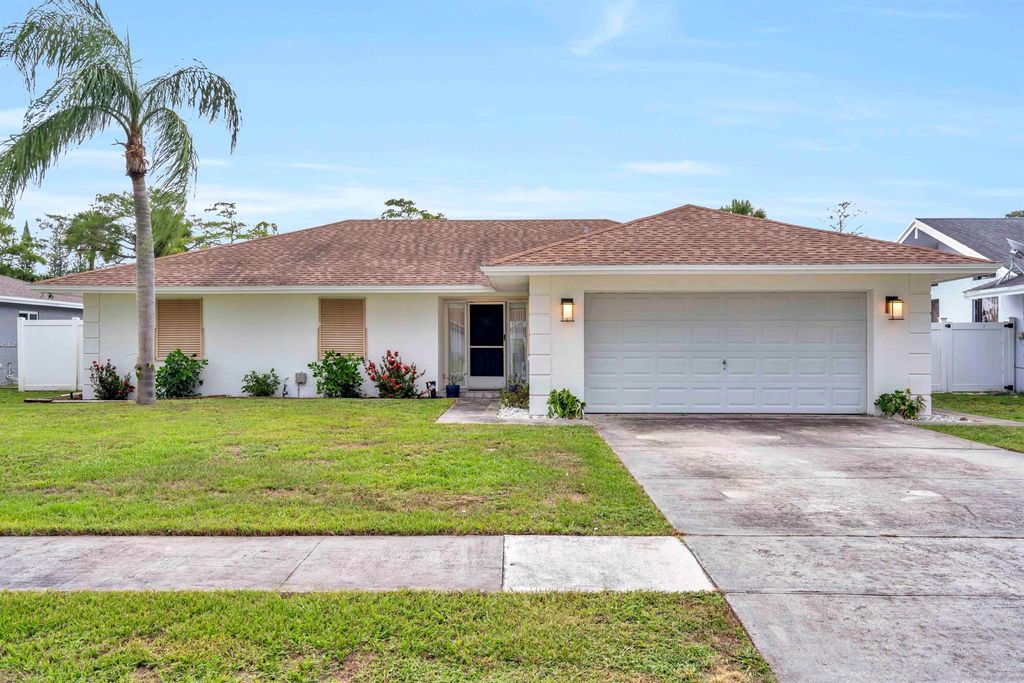 Photo of 108 Timber Run E, Riviera Beach, FL 33407 (MLS # R11099001)