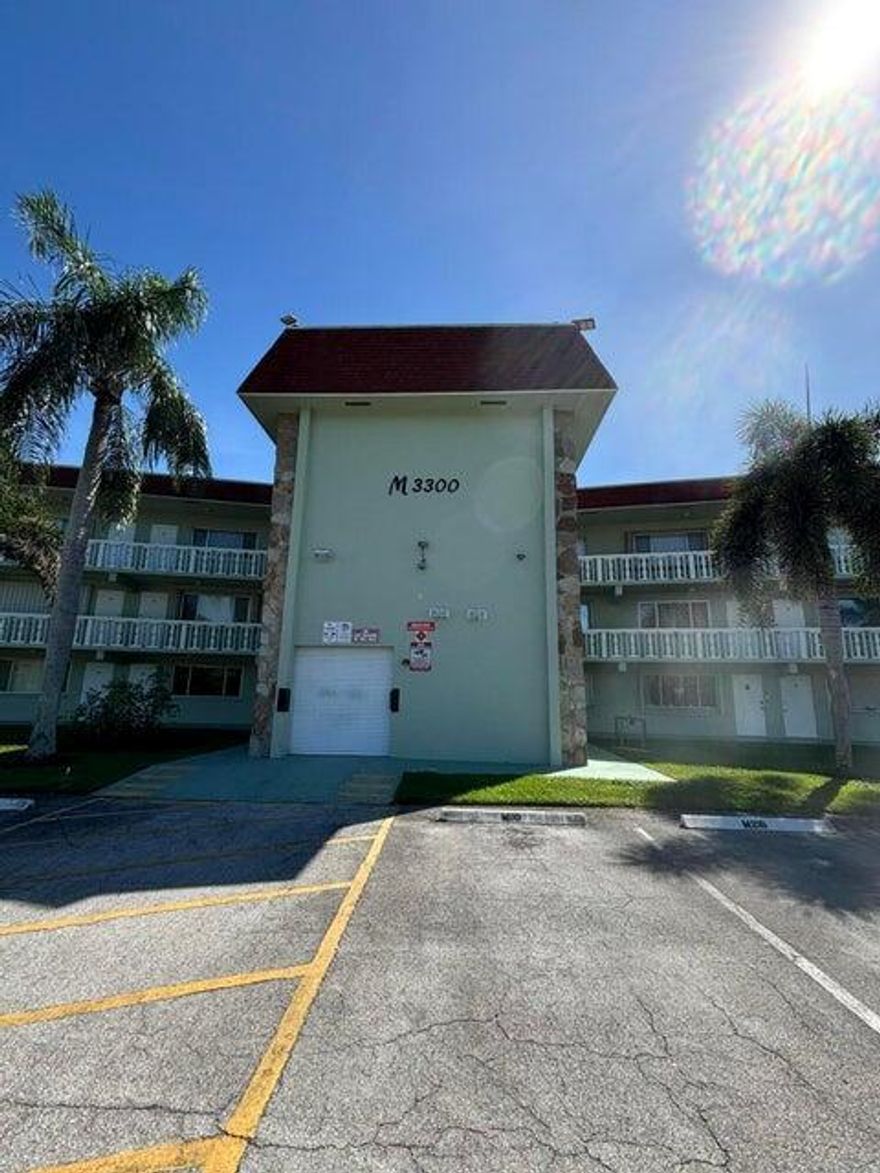 Welcome to this beautifully maintained first-floor condo in the desirable 55+ community of Regal Palms! This inviting 2-bedroom, 1.5-bath unit features well-kept ceramic tile flooring throughout, plus a new refrigerator and range. Enjoy a peaceful and active lifestyle with access to manicured grounds, a community pool, clubhouse, and other fantastic amenities. The building offers elevator access, a laundry room, trash chute, extra storage, and bicycle storage, with basic cable and complimentary washers/dryers included in the HOA dues. Emotional support pets only; no trucks or motorcycles allowed. Don't miss this opportunity--schedule your showing today!