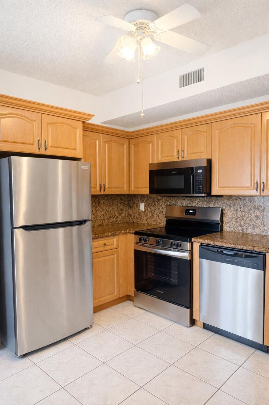 Seller Motivated !! Golf course & Lake views -Priced to Sell Incredible opportunity  to purchase in the sought-after Grand Palms Community in Pembroke Pines!.This spacious condo offers amazing views of the golf course and serene lake. Being Sold As-Is, It's perfect for a buyer ready to add their personal touch. Enjoy peace of mind  , a brand new roof !! wake up to beautiful views and enjoy the Florida lifestyle from your private porch. HOA includes, internet-cable, roof repairs, structural and flood insurance,ADT alarm,water, pool ,and main guard gate and security. A rated schools Bring all reasonable offers. Brand new stainless steel appliances. Get in to this amazing community while its still affordable. And secure your prime location .