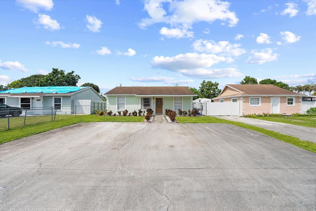 Photo of 1213 Sunrise Road, West Palm Beach, FL 33406 (MLS # R11022678)