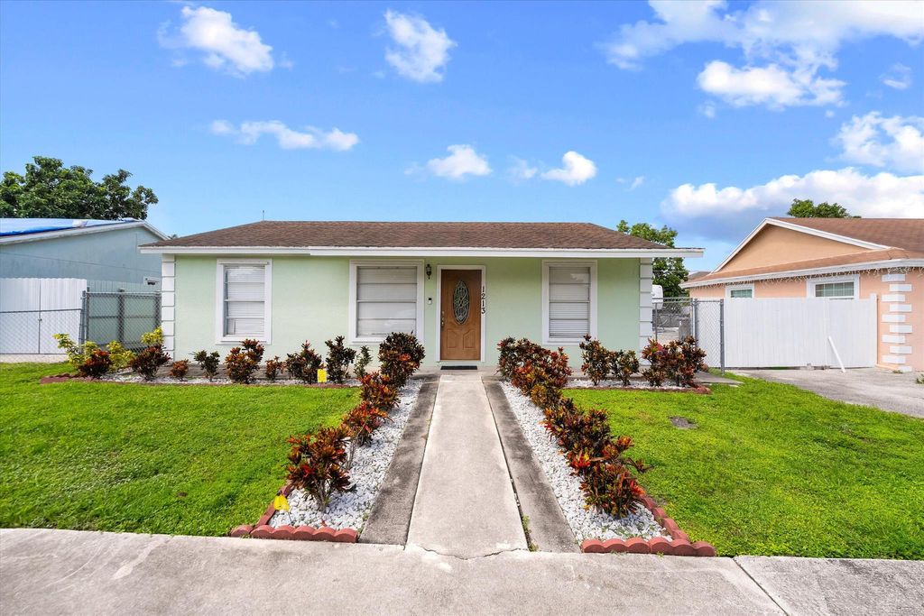 Photo of 1213 Sunrise Road, West Palm Beach, FL 33406 (MLS # R11022678)