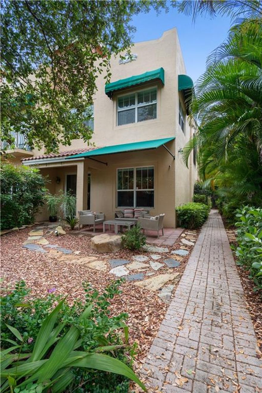 Incredible Property Close To Las Olas!!!  This luxury townhome offers a resort lifestyle in the heart of the city.  A contemporary interior with a large lushly landscaped private entry courtyard and large roof top entertainment area with the BEST VIEWS OF THE FORT LAUDERDALE DOWNTOWN SKYLINE!  This is a very unique and spectacular space features 2 BEDROOMS plus A DEN/OFFICE off of the guest suite. High ceilings, upgrades throughout, stunning staircase, and perfect residence to entertain or enjoy ultimate privacy in a prime location.  Great private parking in addition to a generous size garage.  Furniture Negotiable.  A spectacular hidden gem!