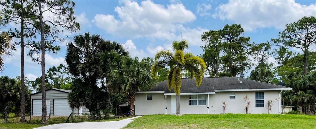 Photo of 15856 63rd Place Pl N, FL 33470 (MLS # R10712334)