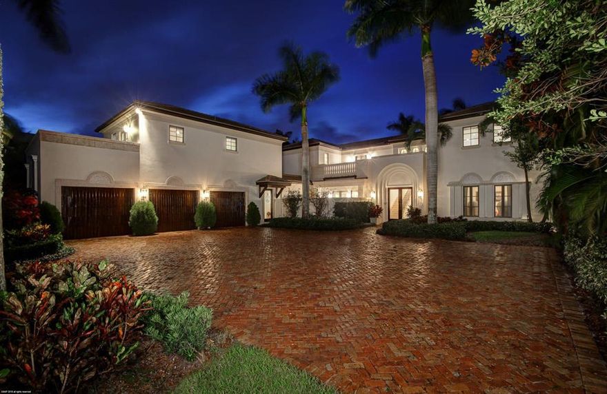 Custom waterfront estate home steps from the Intracoastal Waterway. This estate is perfectly situated on the championship golf course in the front yard and waterway and Intracoastal views in the backyard. The home boasts magnificent features throughout including a chef's kitchen which is open to the family room, first floor master suite, hardwood and stone floors, an elevator and impact windows throughout. Guests will enjoy their private space whether it's in an over-sized VIP suite or the mini apartment with a private entrance. Recently updated resort like pool and spa and a large summer kitchen will draw you in to spend time outdoors relaxing or entertaining. This home, in the prestigious Admirals Cove, is sure to impress.