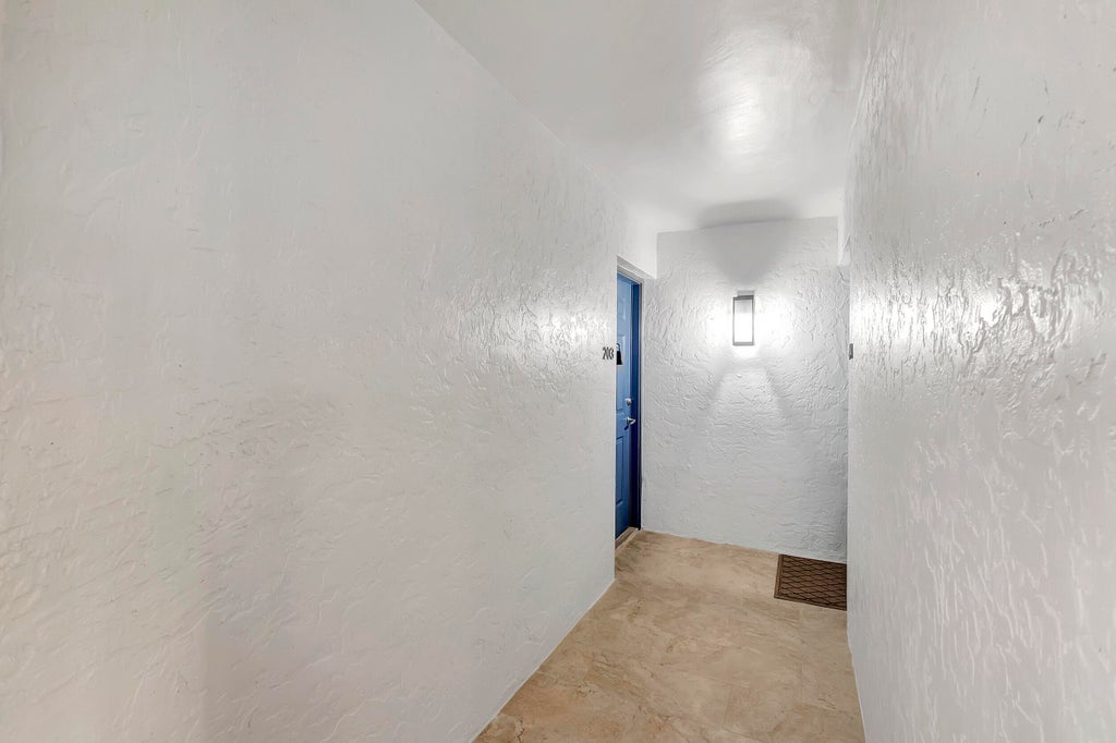 Photo of 3111 Clint Moore Road #203, Boca Raton, FL 33496 (MLS # B26041047)