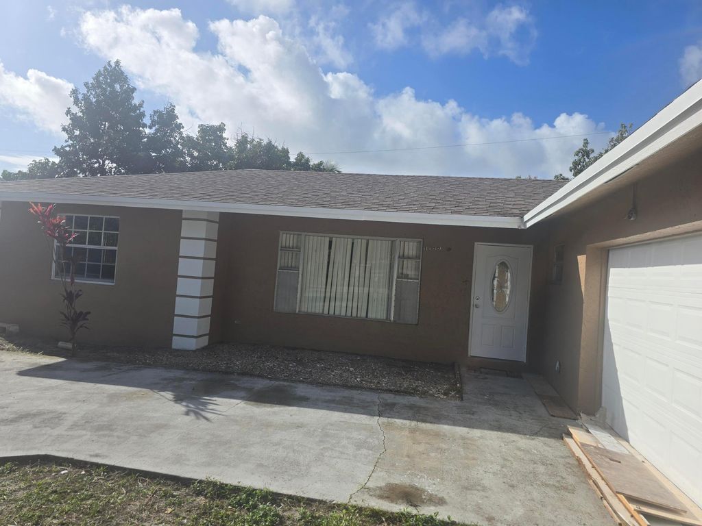Photo of 1072 Mentone Road, Lake Worth, FL 33462 (MLS # R11168522)