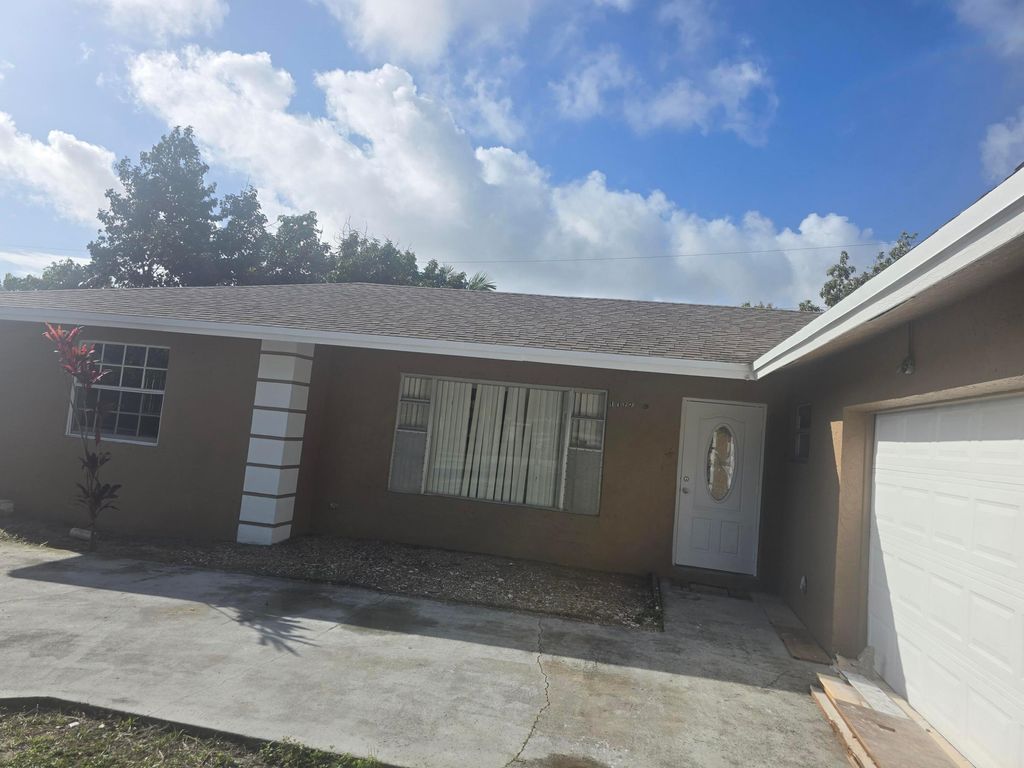 Photo of 1072 Mentone Road, Lake Worth, FL 33462 (MLS # R11168522)