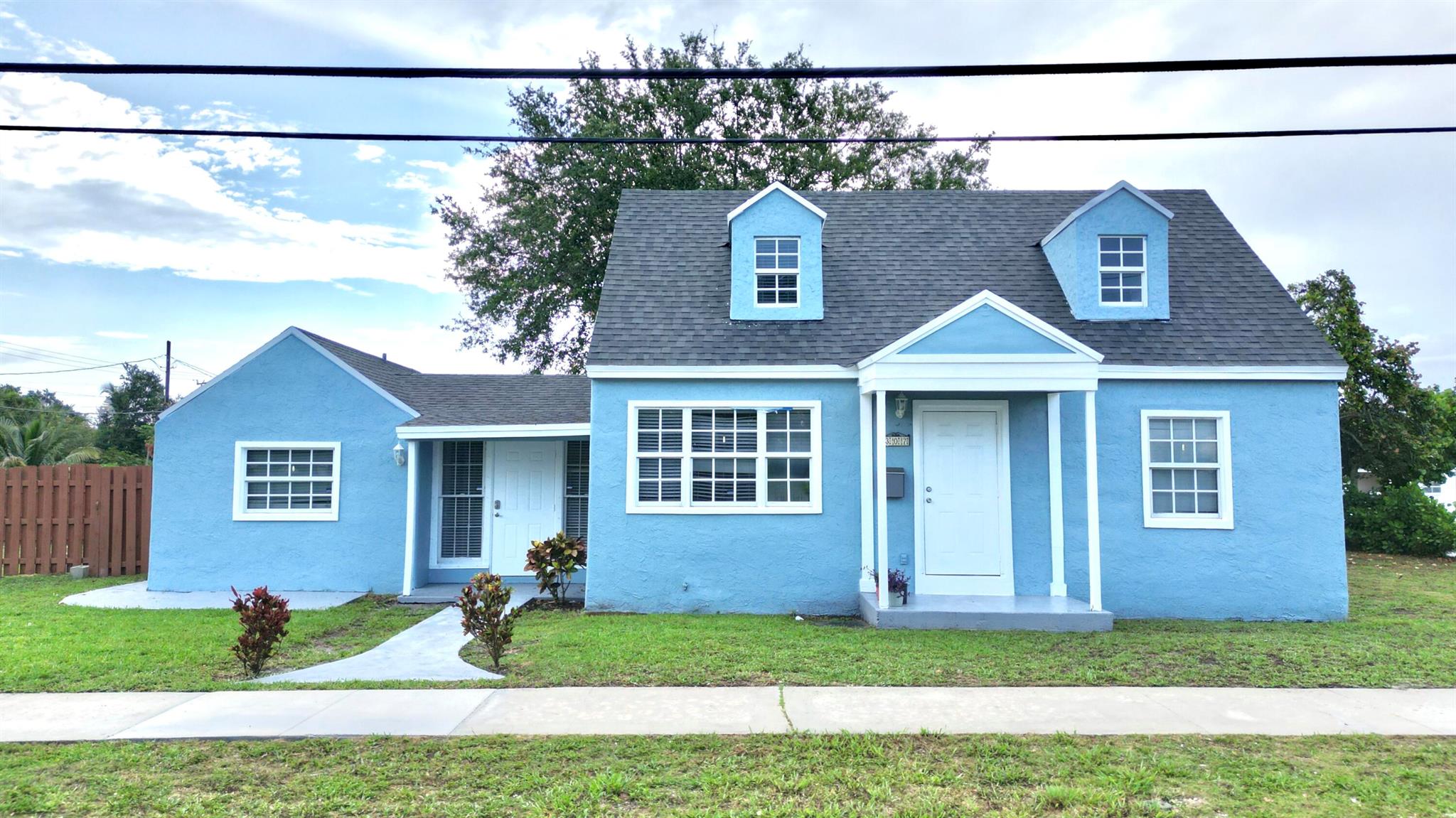Completely remodeled inside and out--move-in ready! This beautifully updated home sits on an oversized, fully fenced corner lot and features a spacious interior with large bedrooms and stylish finishes throughout. Enjoy brand-new appliances, modern lighting, and a fresh, contemporary feel in every room. The expansive family room and open dining area offer plenty of space for entertaining. All major systems have been updated. A perfect opportunity for first-time buyers seeking great value with nothing left to do but move in!