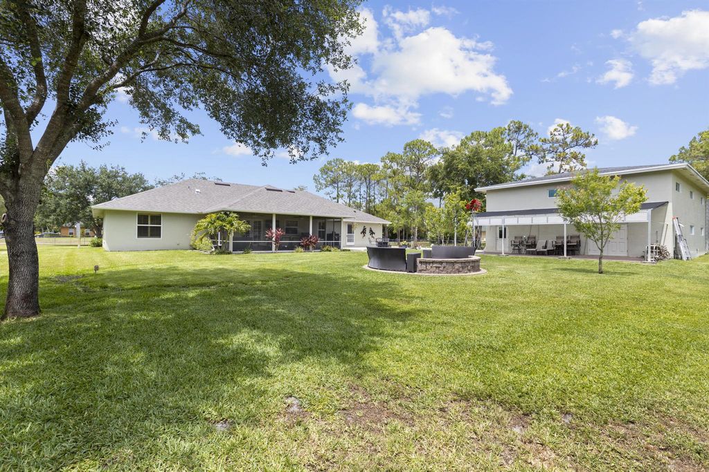 Photo of 14918 Tangelo Boulevard, West Palm Beach, FL 33412 (MLS # R11089623)