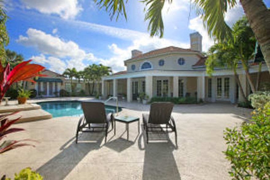 10.95 acre equestrian estate home in a gated Palm Beach Point, hacking distance to Grand Prix Village & WEF Showgounds. 12 Stall barn(can have up to 24). Spacious main residence w/3 bedroom suites, all opening to the heated pool & patio. Beautifully appointed with custom kitchen cabinetry, oversized butler's pantry, wide-plank wood floors, granite & marble finishes, wood beamed ceilings & a fireplace. The European courtyard Style stable was completely updated in 2014 - all new stall fronts, doors, brick paver aisle ways & center courtyard, exterior window shutters and 3 new wash racks. Above the barn are two, 1BR/1Bth grooms apartments with a shared balcony. There is an additional CBS constructed 100' x 60' outbuilding - easily converts to a custom designed center-aisle barn. This out-building could also house a work shop, RV, work out room or offer additional space for the car collector. It currently has additional stalls using portable European style systems. There is a beautiful 300' X 200' riding arena with great drainage and footing. The property lends its self perfectly for constructing a covered riding arena. There are 10 large grass paddocks, 2 of which are run-outs from stalls and a round pen. The property has separate entrances for the residence and stables. The private cul-de-sac location on the bridle path, is priceless. There are endless possibilities for this one of a kind property, its a must see to appreciate. It currently produces over $220,000 a year in gross income. The entire exterior of the house, stable and outbuilding were repainted in 2014. The property would easily be approved for up to 24 stalls. If you're looking for wonderful amenities, privacy, and a great location in close proximity to the show this is the property to see! A simple 1/2 Mile hack by bridle path to Grand Prix Village and WEF