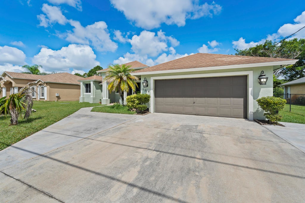Photo of 5514 NW West Lundy Circle, Port Saint Lucie, FL 34986 (MLS # B26037922)