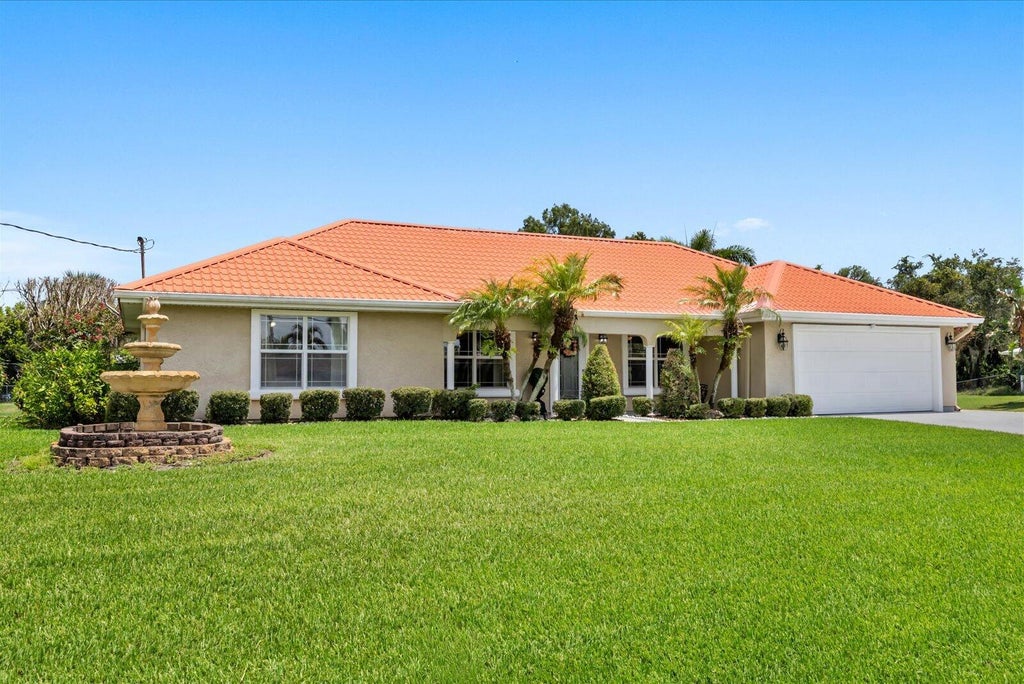 Photo of 1819 SE ELROSE Street, Port Saint Lucie, FL 34952 (MLS # B26067986)