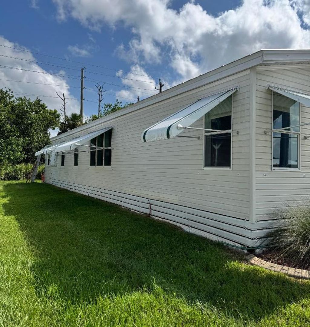 Photo of 35 La Puerta Del Norte, Fort Pierce, FL 34951 (MLS # R11111958)