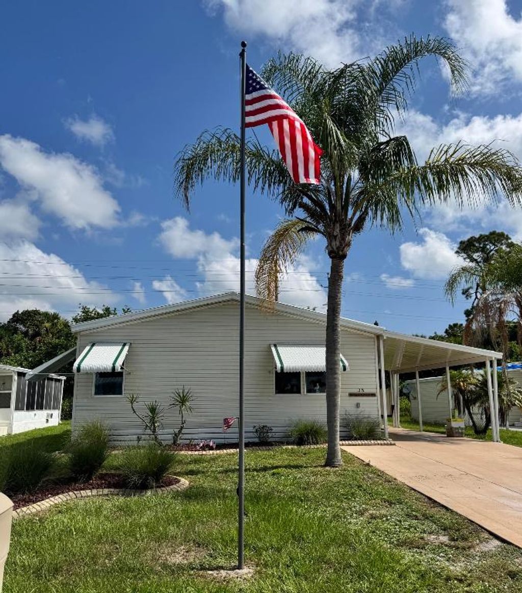 Photo of 35 La Puerta Del Norte, Fort Pierce, FL 34951 (MLS # R11111958)