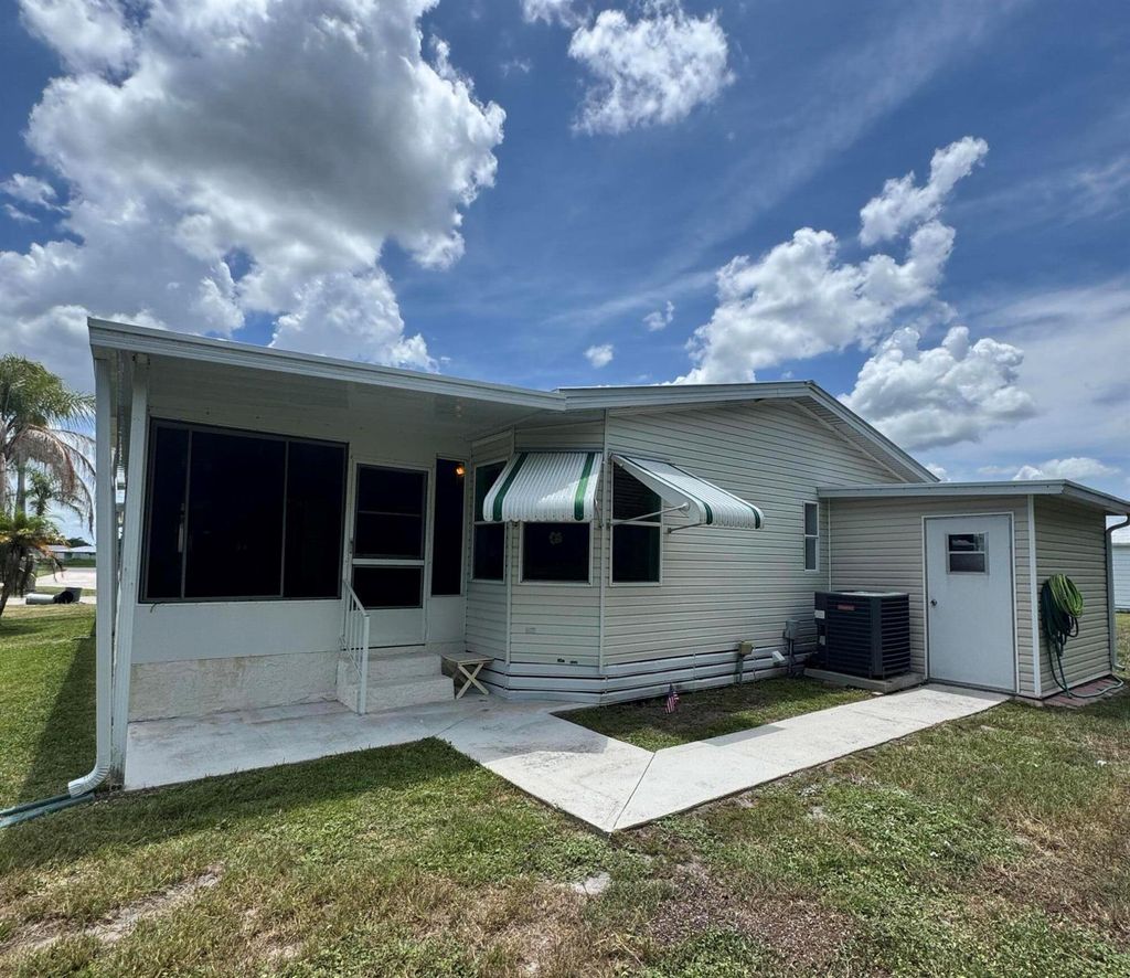 Photo of 35 La Puerta Del Norte, Fort Pierce, FL 34951 (MLS # R11111958)
