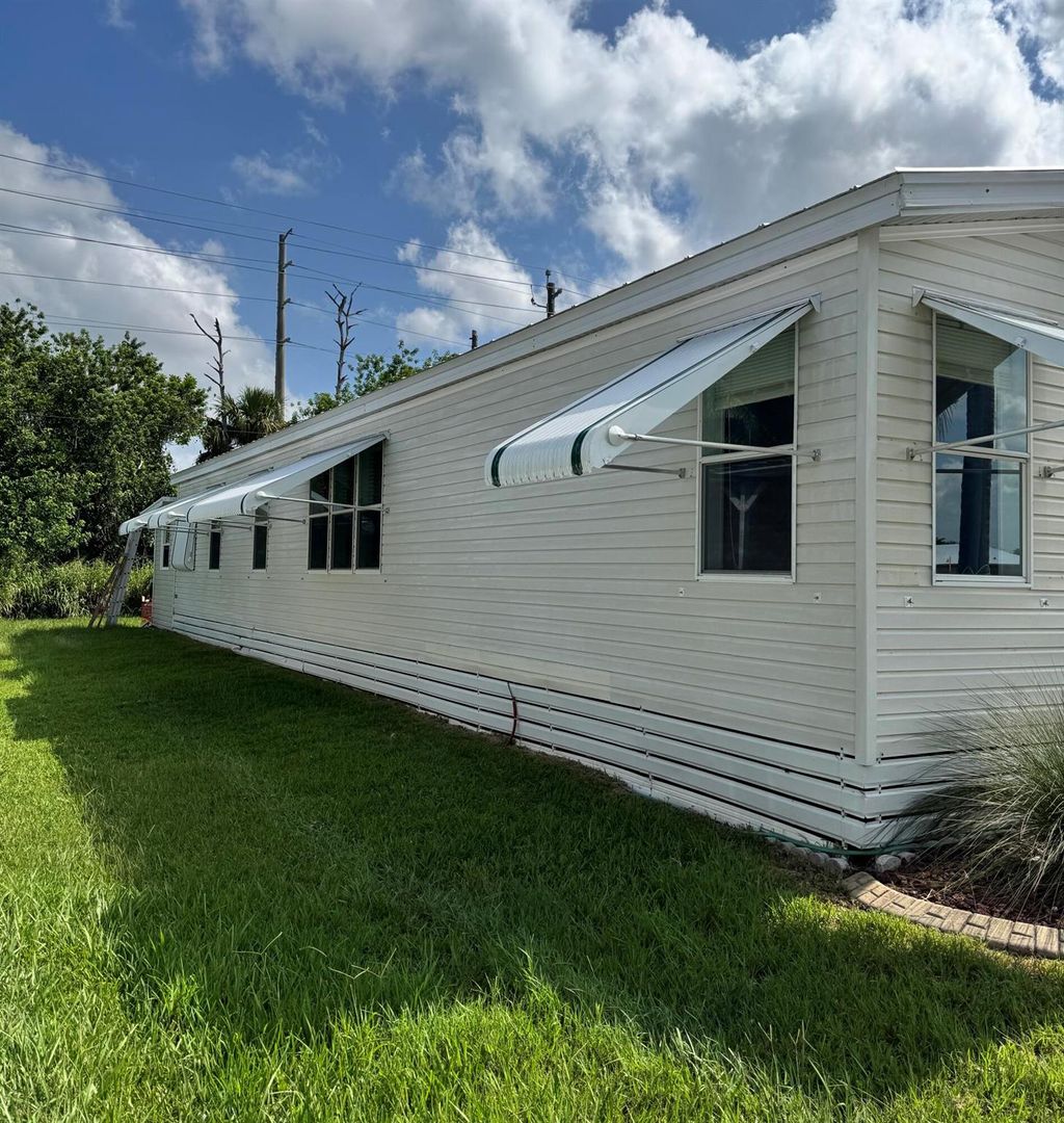 Photo of 35 La Puerta Del Norte, Fort Pierce, FL 34951 (MLS # R11111958)