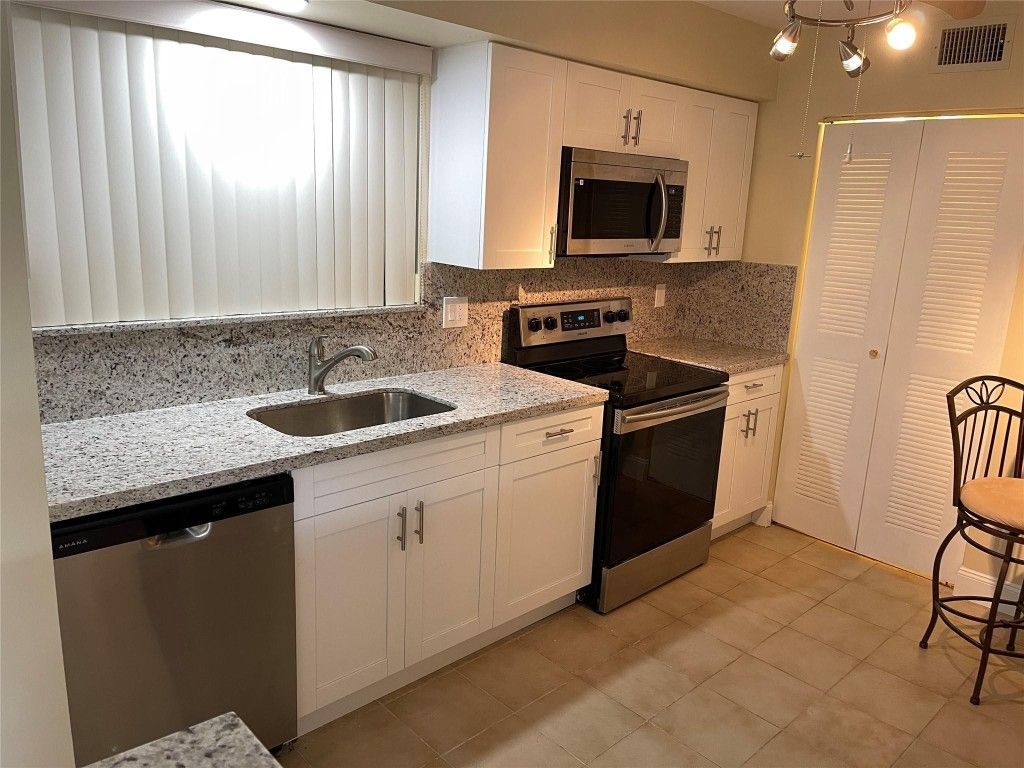 Photo of 5936 Morningstar Circle #203, Delray Beach, FL 33484 (MLS # F10529171)