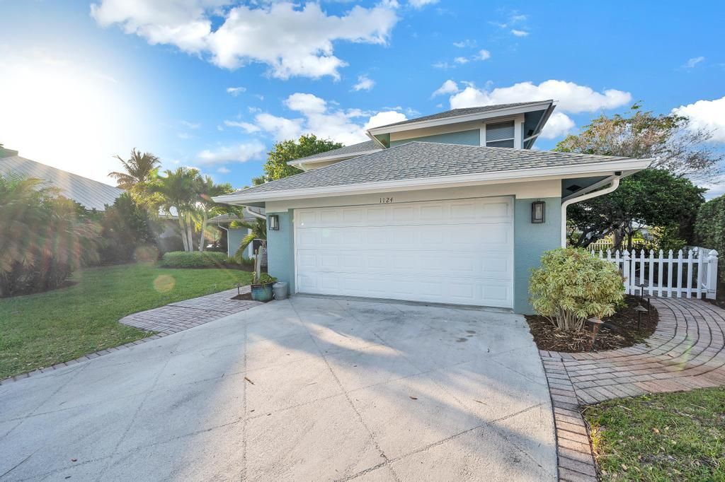 Photo of 1124 SW Oak Hollow Court, Palm City, FL 34990 (MLS # R10976317)