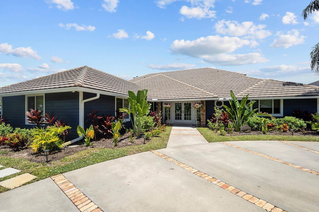 Photo of 18144 SE Ridgeview Dr, Tequesta, FL 33469 (MLS # F10393870)