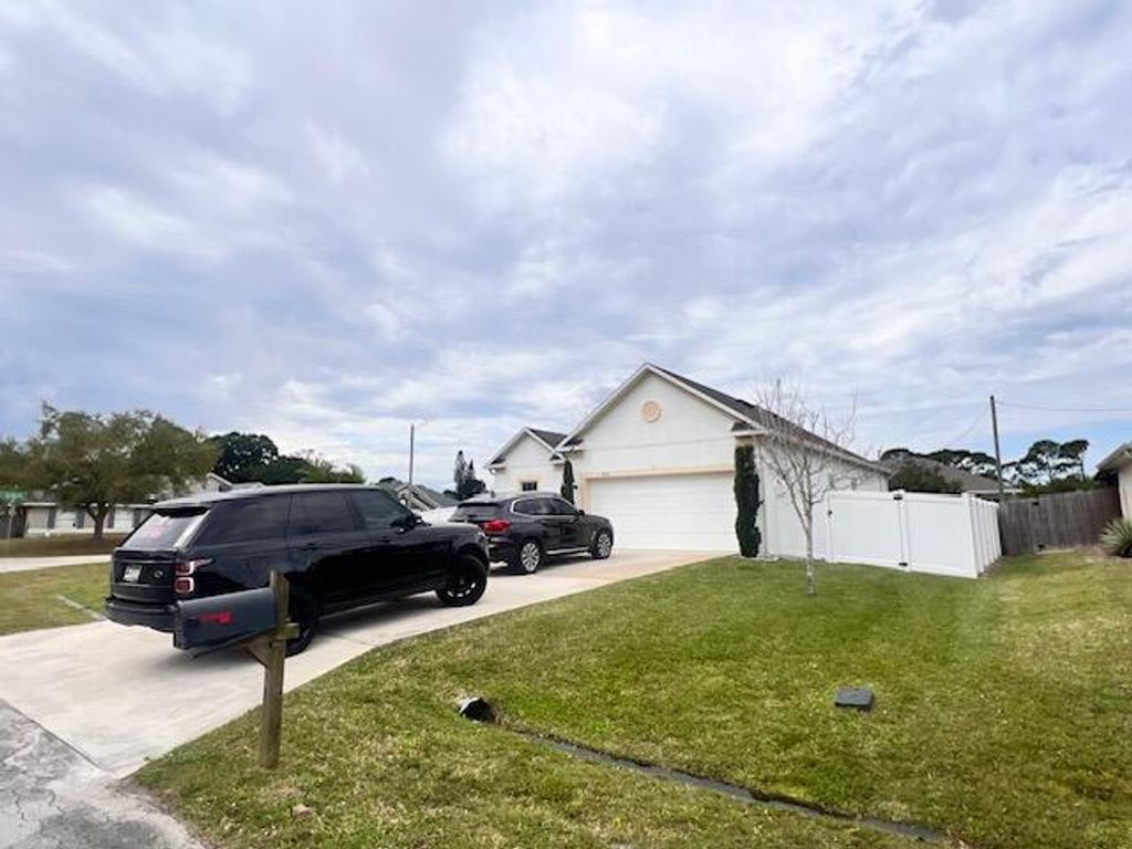 Photo of 3230 SW Regatta Street, Port Saint Lucie, FL 34953 (MLS # R11111801)