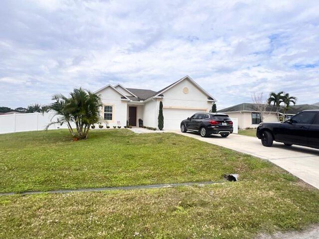 Photo of 3230 SW Regatta Street, Port Saint Lucie, FL 34953 (MLS # R11111801)
