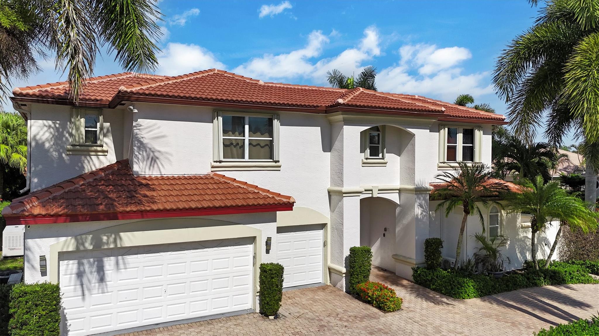 Luxurious two-story home in The Shores at Boca Raton with 5 bedrooms, 4½ baths, and over 3,400 sq ft of refined living space. The first-floor master suite offers privacy and convenience. Beautiful porcelain tile and luxury vinyl plank flooring throughout. Enjoy the backyard oasis featuring a heated saltwater pool, spa, limestone deck, and gourmet summer kitchen with granite counters and stainless appliances. Includes a versatile pool house/guest room. Equipped with a 30 kW automatic generator and propane storage. Situated on a corner lot in a gated community with clubhouse, fitness center, tennis, pickleball, pools, playgrounds, and walking paths. Close to top schools, dining, and shopping. Rare opportunity—schedule your private showing today.