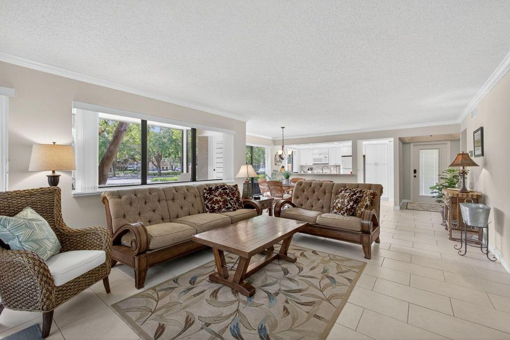 Photo of 113 Brackenwood Road, Palm Beach Gardens, FL 33418 (MLS # R11132883)