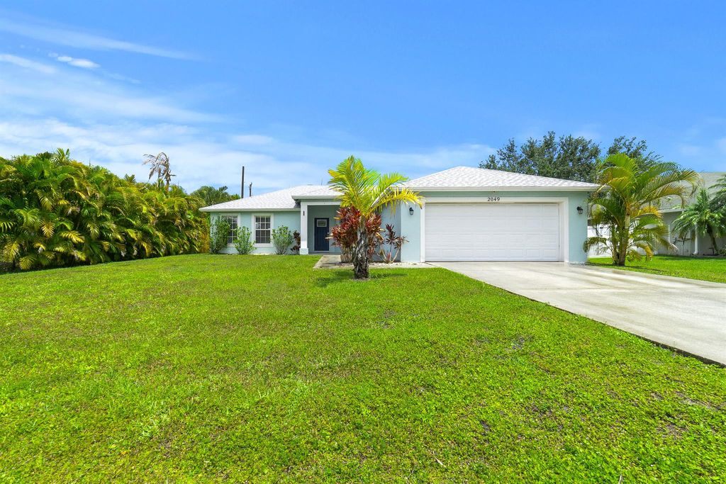 Photo of 2049 SW Beauregard Street, Port Saint Lucie, FL 34953 (MLS # R11089136)