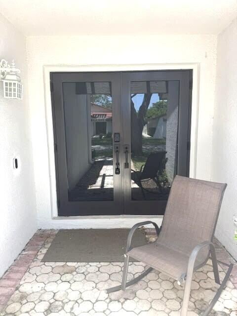 Photo of 627 Hollows Circle, Deerfield Beach, FL 33442 (MLS # B26052774)