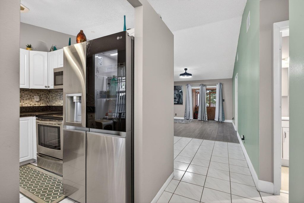 Photo of 540 NW 43rd Street, Deerfield Beach, FL 33064 (MLS # R11163769)