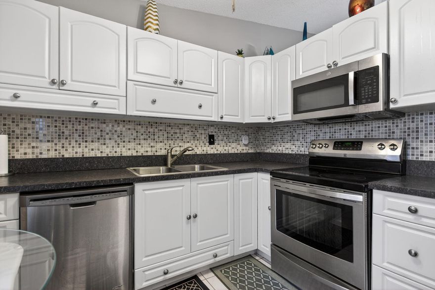 Enjoy waterfront living in this fully updated 2-bedroom, 2-bath townhome on a wide canal with a brand-new private dock. Pull into your spacious 2+ car driveway and step inside to modern upgrades throughout, 2023 roof, updated kitchen and bathrooms, new flooring, new electrical panel, and 2024 water heater. Plus, a separate shed for extra storage.

Low HOA of just $33/month (paid quarterly) with access to the community pool, tennis, and basketball courts. No rental waiting period, investor, family, and pet friendly with fast HOA registration.

Move-in ready and priced to impress.