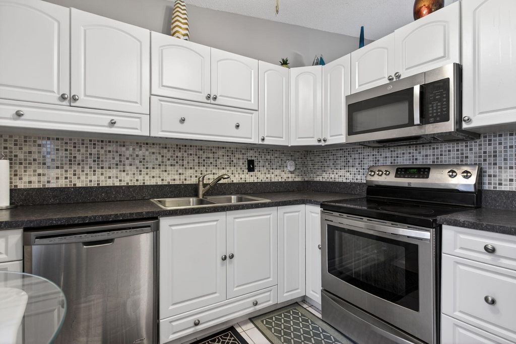 Photo of 540 NW 43rd Street, Deerfield Beach, FL 33064 (MLS # R11163769)