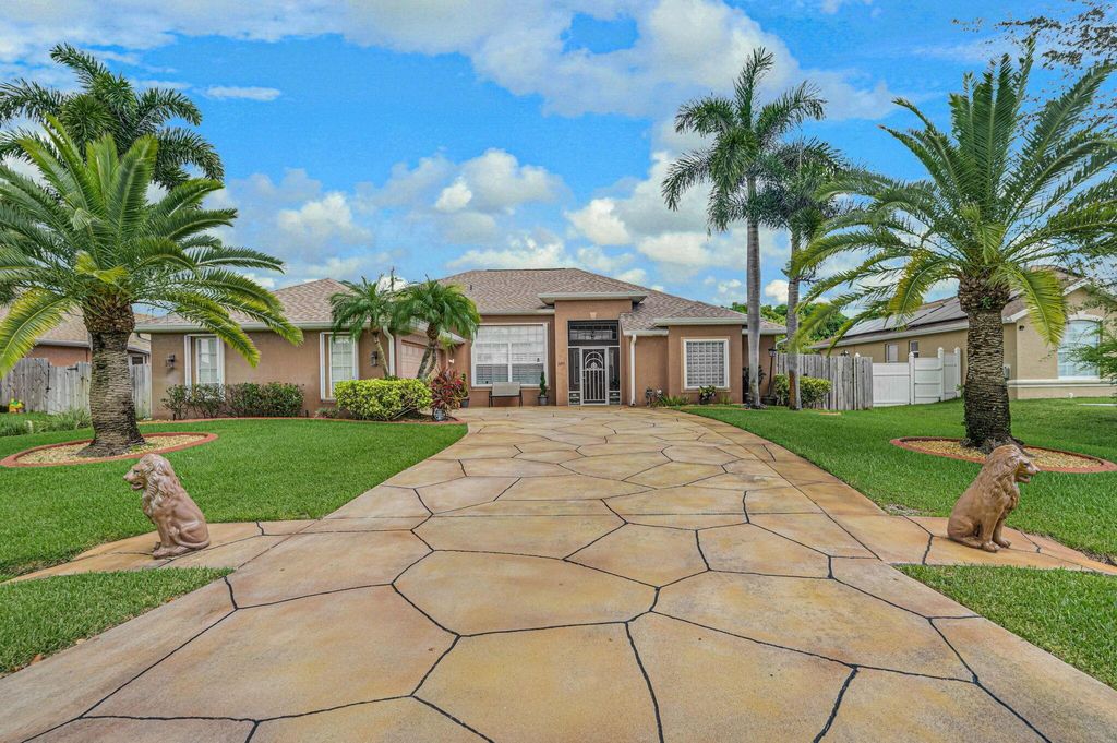 Photo of 5495 NW Evanston Avenue, Port Saint Lucie, FL 34983 (MLS # R11004175)