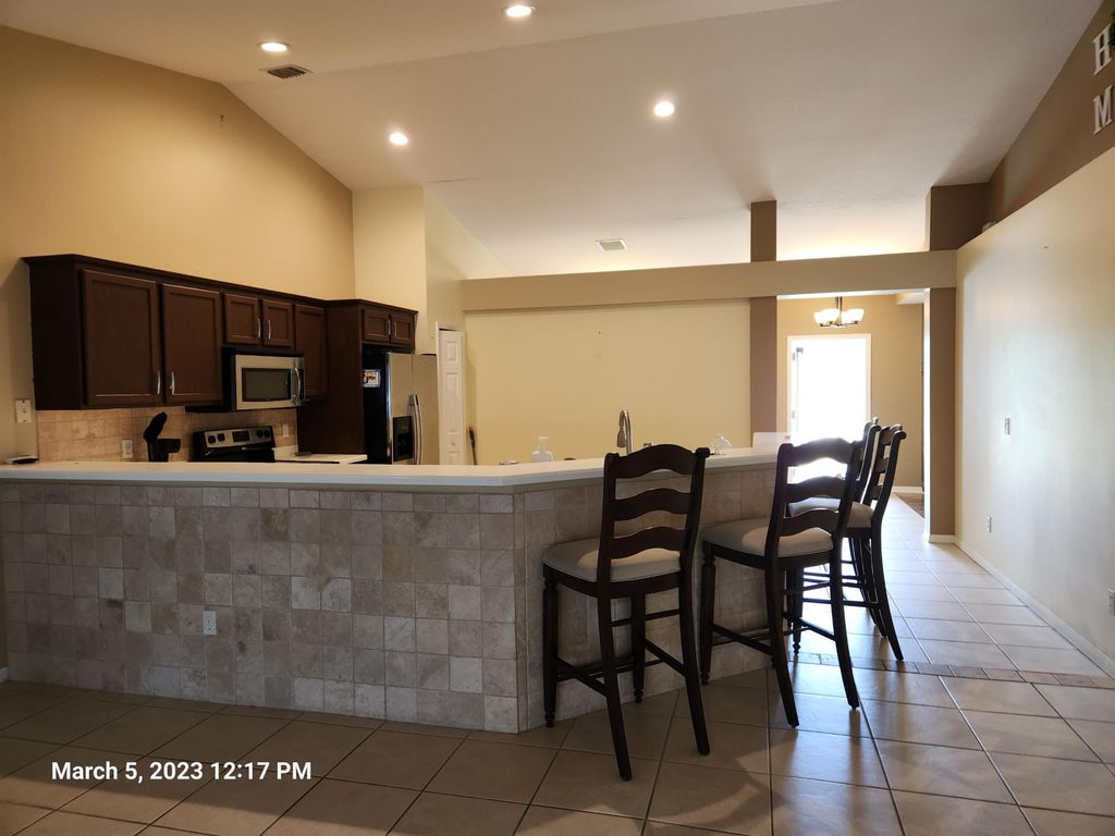 Photo of 3672 SW Carmody Street, Port Saint Lucie, FL 34953 (MLS # R11134014)