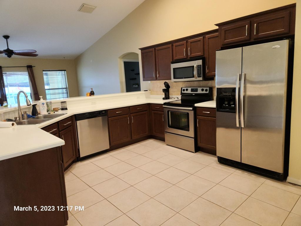Photo of 3672 SW Carmody Street, Port Saint Lucie, FL 34953 (MLS # R11134014)