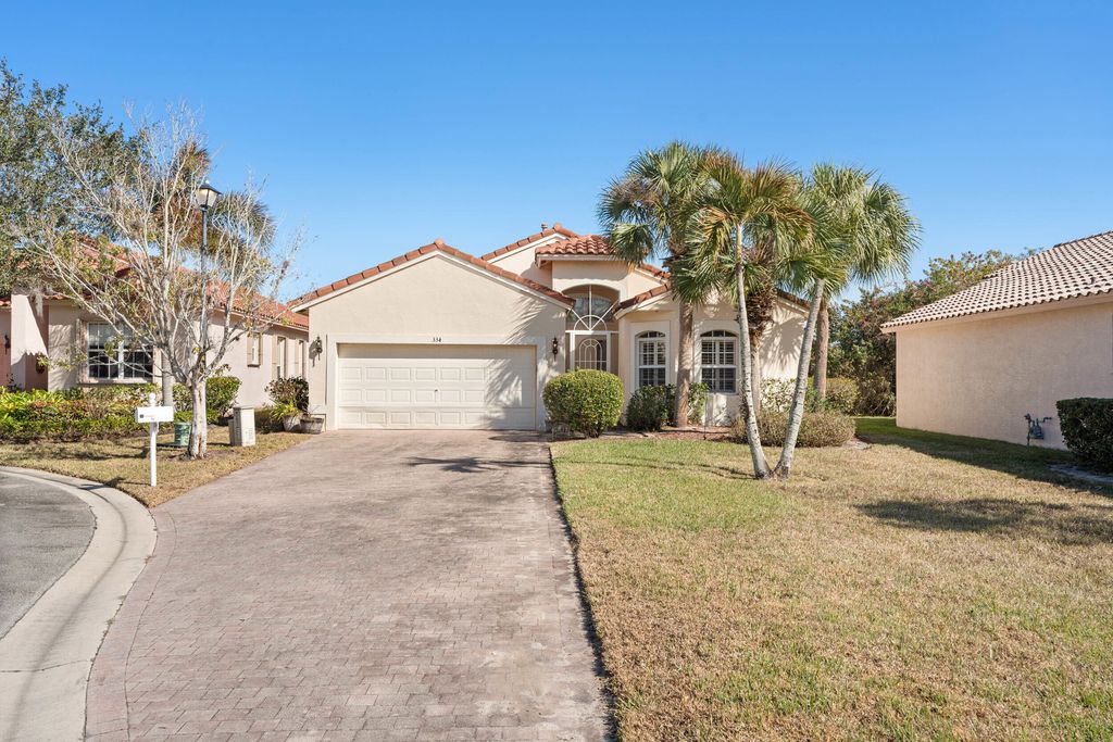 Photo of 334 NW Millpond Lane, Port Saint Lucie, FL 34986 (MLS # R11160971)