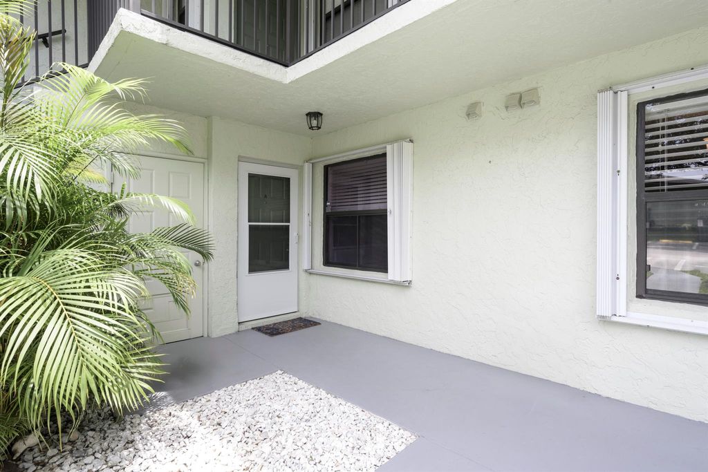 Photo of 1301 Sabal Ridge Circle #A, Palm Beach Gardens, FL 33418 (MLS # R11011179)