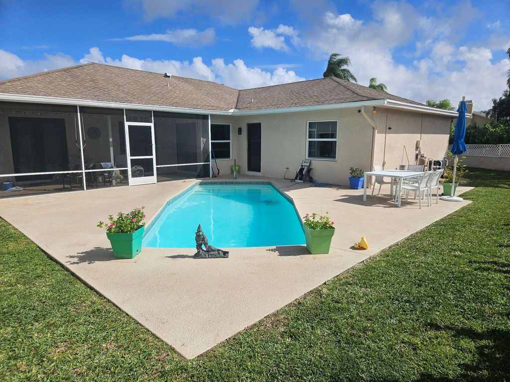 Photo of 7597 N Nemec Dr Drive N, Lake Clarke Shores, FL 33406 (MLS # B26001958)