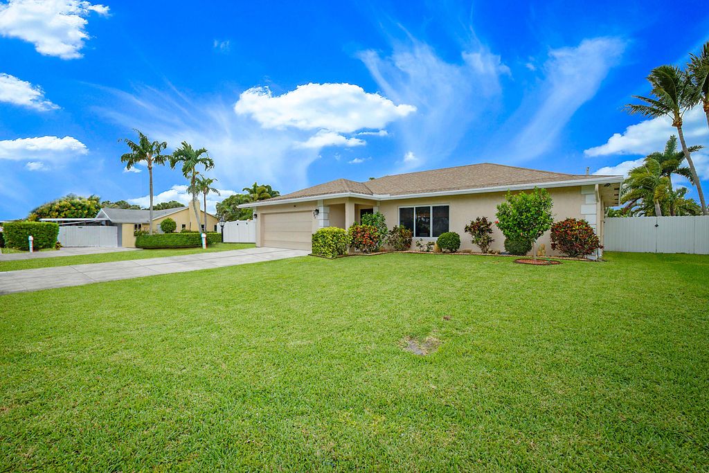 Photo of 7597 N Nemec Dr Drive N, Lake Clarke Shores, FL 33406 (MLS # B26001958)