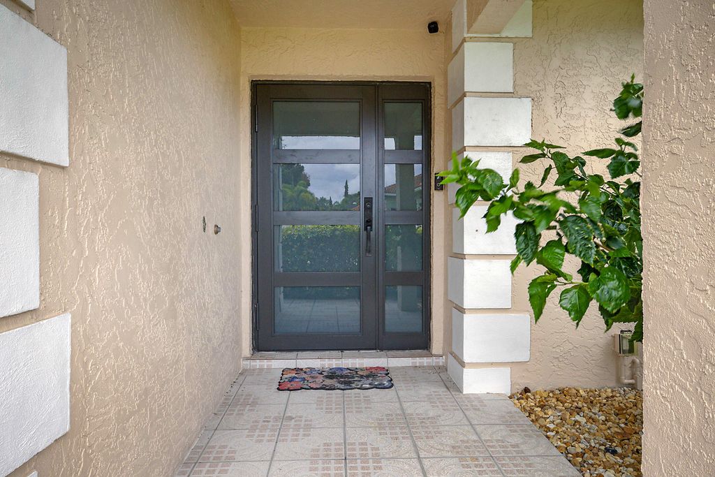 Photo of 7597 N Nemec Dr Drive N, Lake Clarke Shores, FL 33406 (MLS # B26001958)