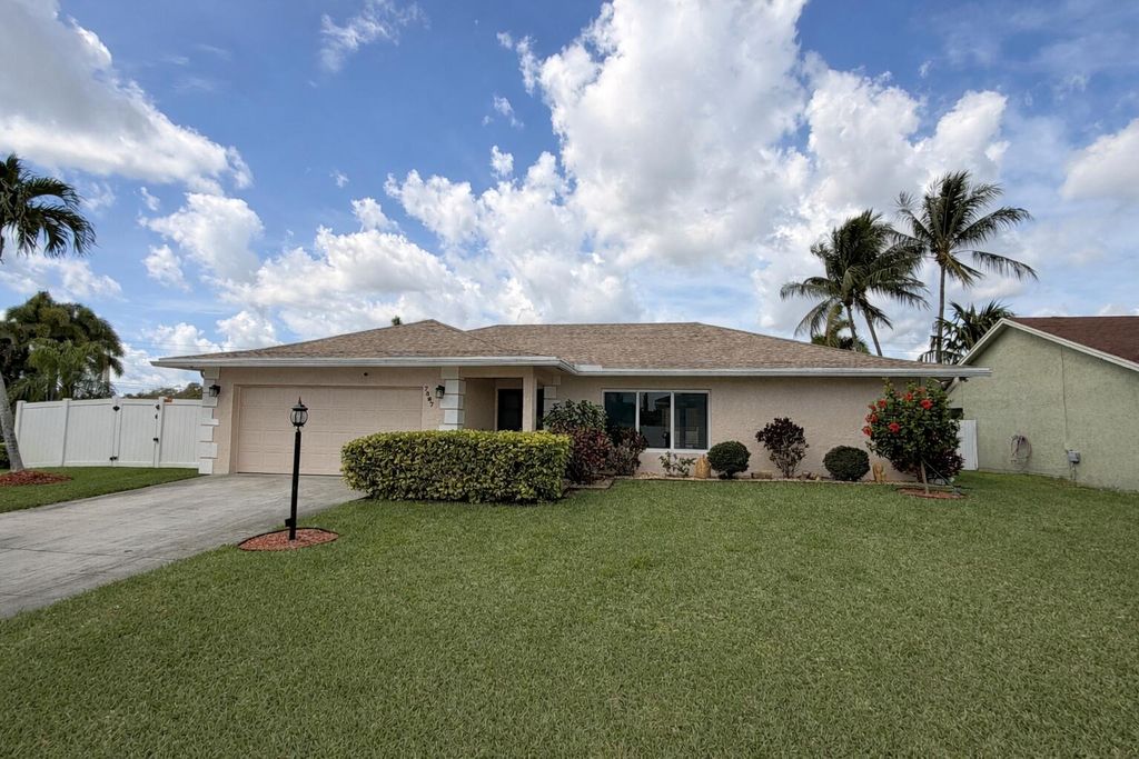 Photo of 7597 N Nemec Dr Drive N, Lake Clarke Shores, FL 33406 (MLS # B26001958)